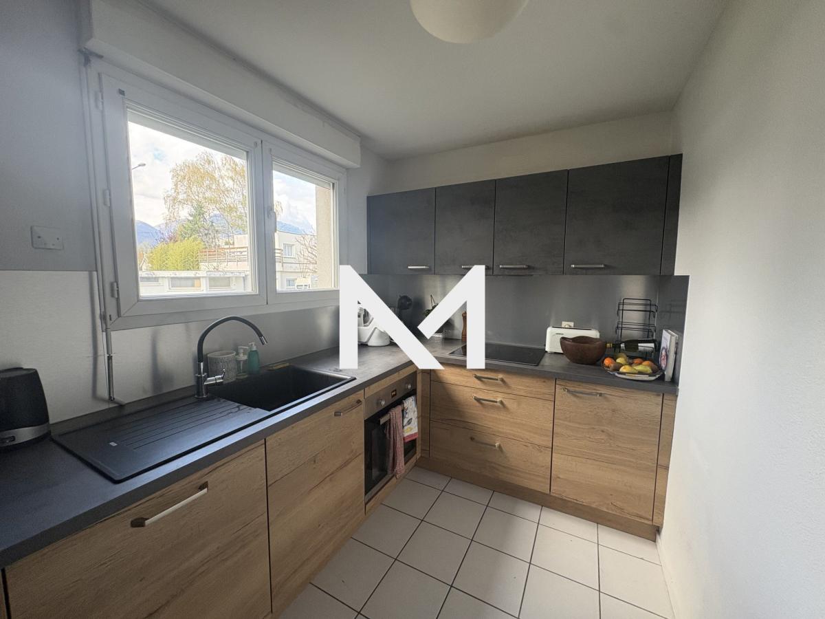 Grenoble - T2 en rez-de-jardin - Garage - Photo 1