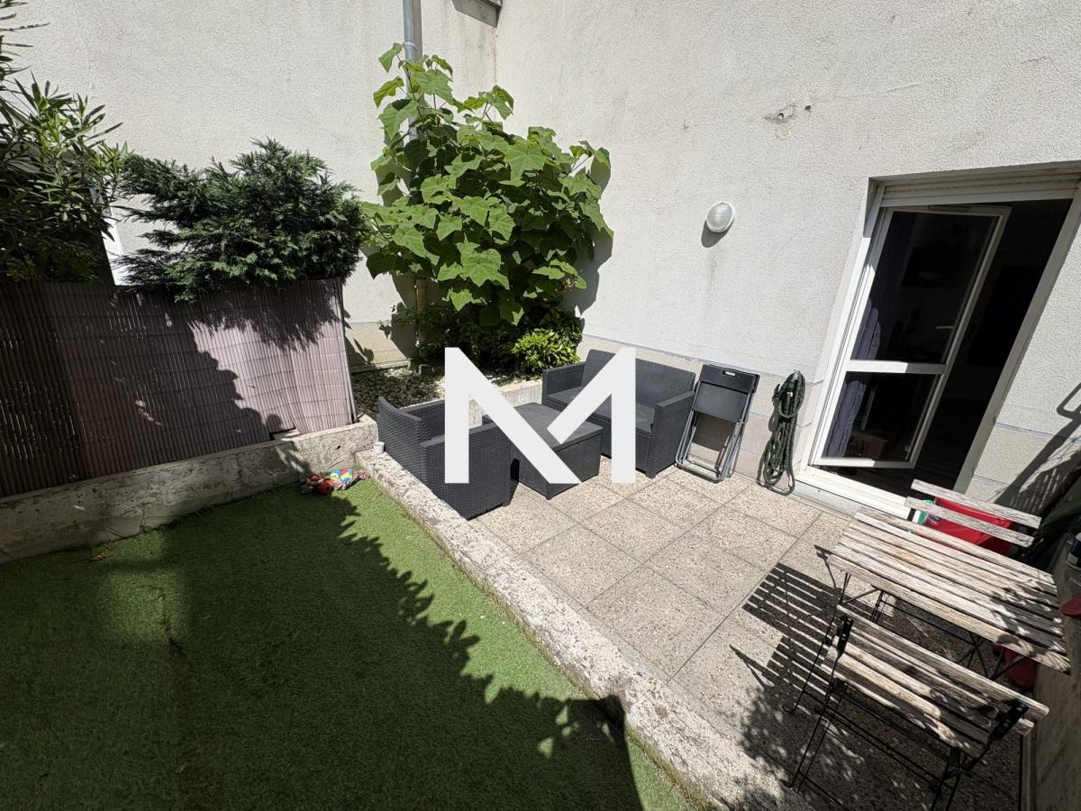 Grenoble - T2 en rez-de-jardin - Garage - Photo 1