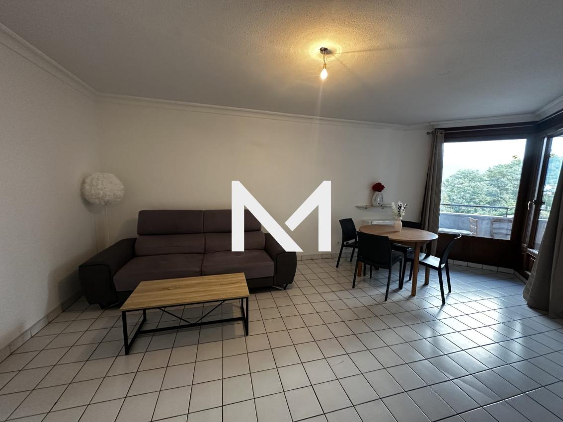 FONTAINE - T3 MEUBLE AVEC GRAND BALCON ET GARAGE - Photo 4